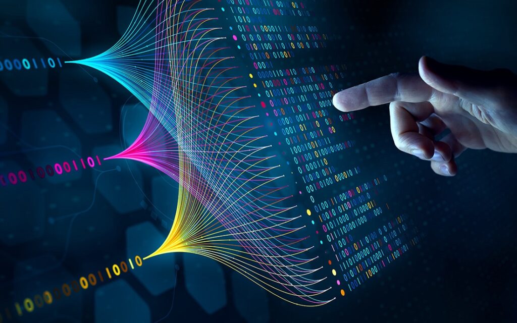 Image of a finger pointing at a series of ones and zeros, representing data feeding into an AI algorithm.