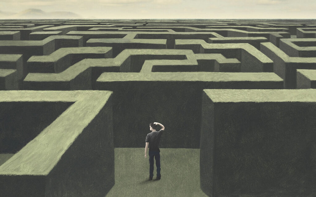 Illustration of man lost in a complex labyrinth, surreal abstract concept ©fran_kie / Adobe Stock