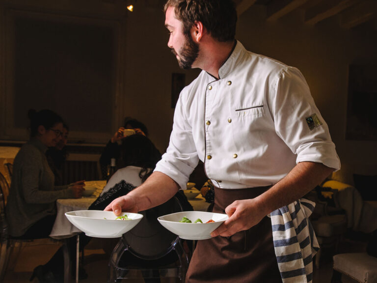 Chef serving outlet dishes