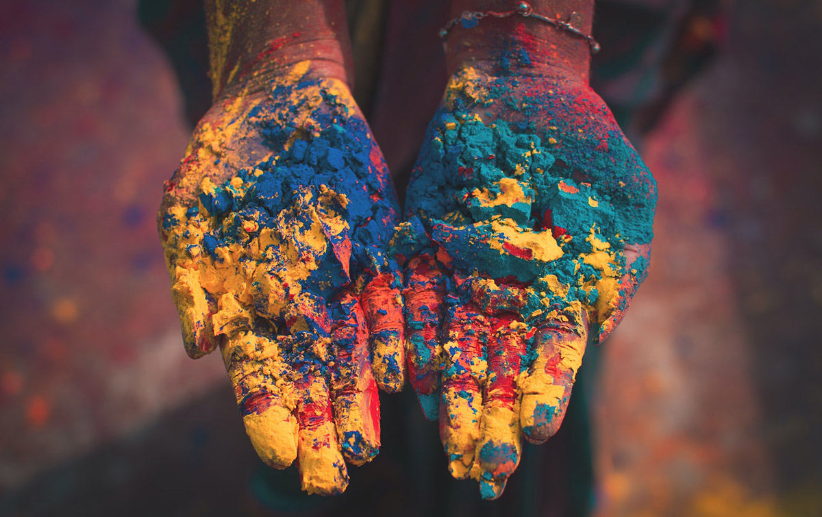 Closeup photo of person holding color soils, © Debashis RC Biswas / Unsplash