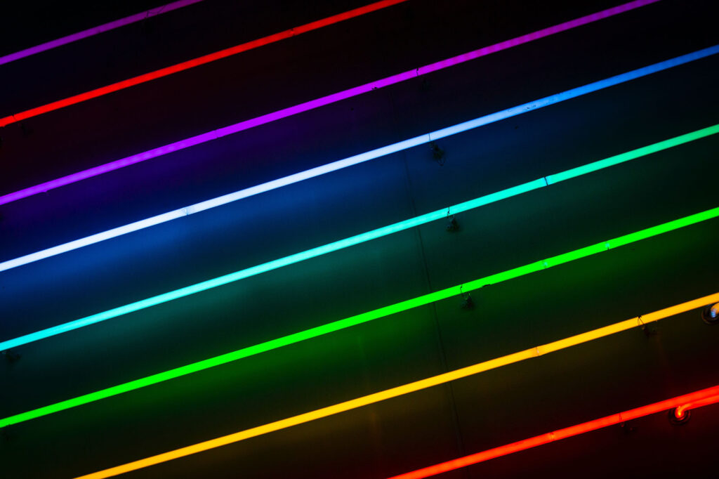 Feature photo by Drew Beamer/Unsplash. Rainbow lights.