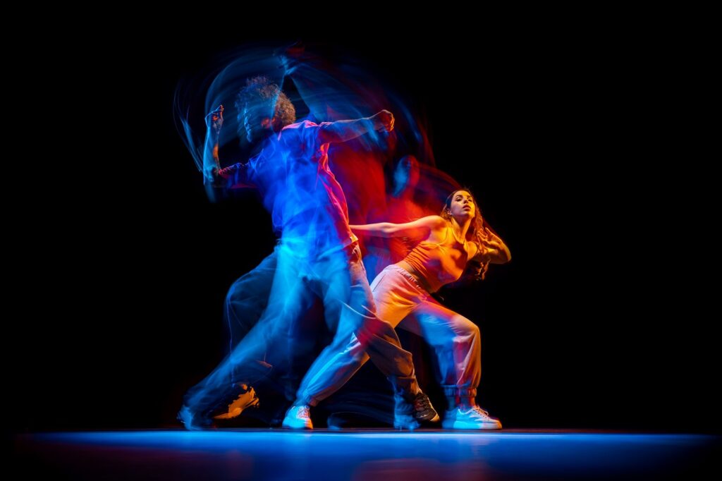 Young man and woman dancing to hip hop to illustrate an article about the power of urban dance to foster inclusion