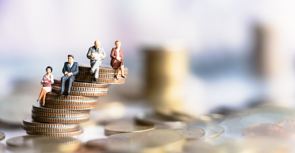 Miniature people: Elderly people sitting on coins stack.